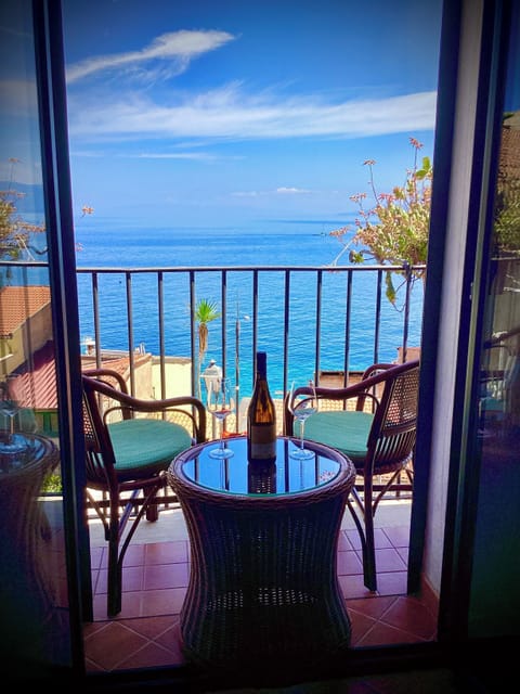 Standard Double Room, Sea View | Minibar, in-room safe, desk, cribs/infant beds