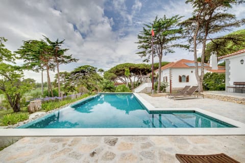 Outdoor pool, open 9:30 AM to 7:00 PM, pool umbrellas, sun loungers