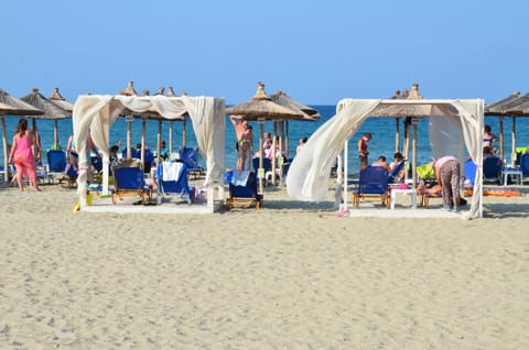 Private beach, sun loungers, beach umbrellas, beach towels