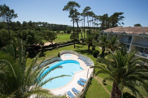 Cool off in the seasonal outdoor swimming pool.