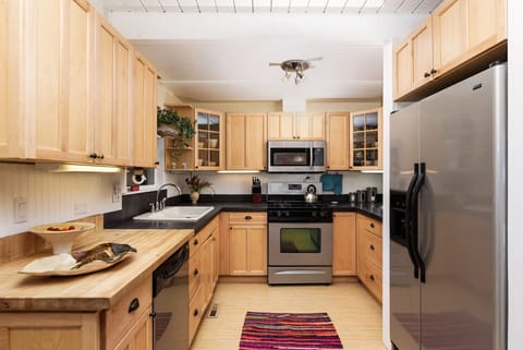 Well-appointed kitchen for your cooking pleasure including handmade dishes.