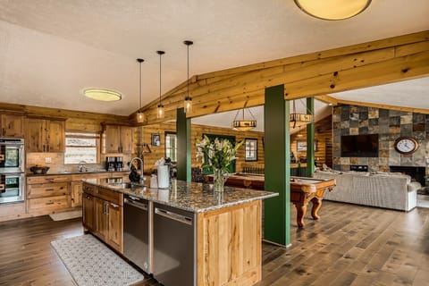 Kitchen with double ovens, 2 dishwashers, glass cook top, full size freezer and full size refrigerator, microwave