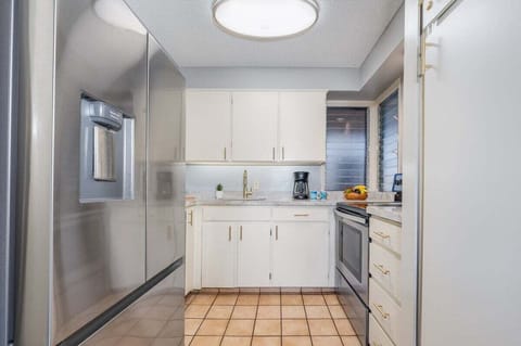 Enjoy cooking at your fully furnished kitchen with stainless steel appliances