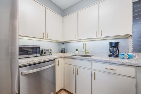 Fully equipped kitchen with modern appliances and everything you need