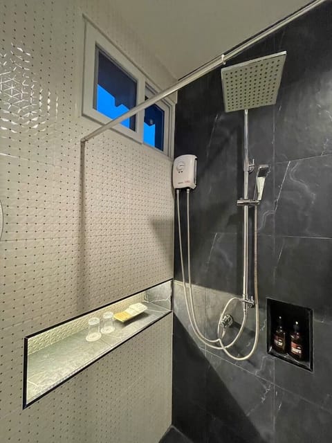 Bungalow, Pool View | Bathroom | Shower, free toiletries, towels