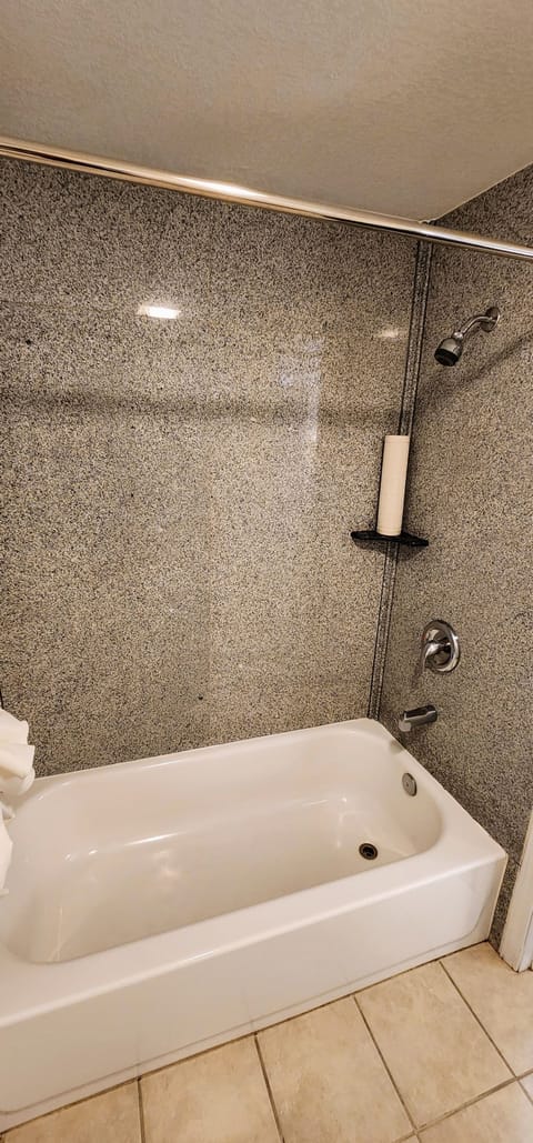 Room, 1 King Bed, Non Smoking | Bathroom | Shower, towels