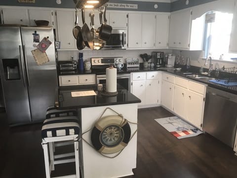 Nautical themed kitchen and breakfast room. Very well provisioned. Alexa enabled