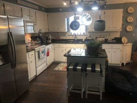 Nautical themed kitchen and breakfast room. Very well provisioned. Alexa enabled