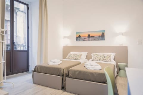 Standard Double or Twin Room | Minibar, in-room safe, desk, laptop workspace