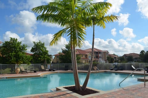 Outdoor pool, open 8:00 AM to 6:00 PM, pool umbrellas, sun loungers