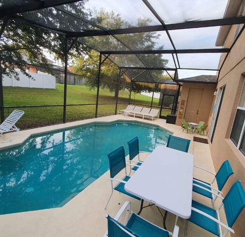 large swimming pool with optional security fence (Toilet in the corner with AC) 