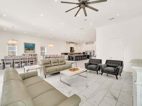 Crisp Lines Meet Beachy Feel in this Massive First Floor Living Space