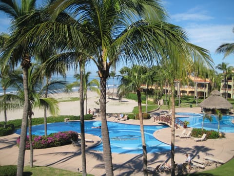 From your balcony see the pool and hot tub and they lead right onto the beach.