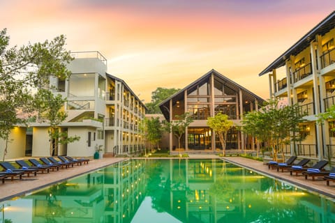 Outdoor pool, open 7:00 AM to 11:00 PM, sun loungers