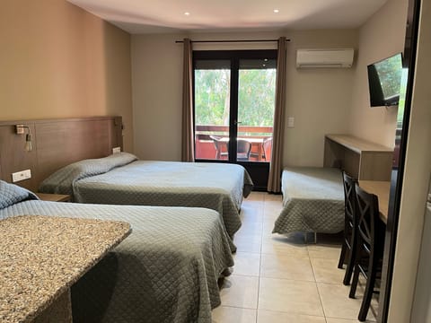 Comfort Studio Suite, Garden View | Individually decorated, individually furnished, desk, blackout drapes