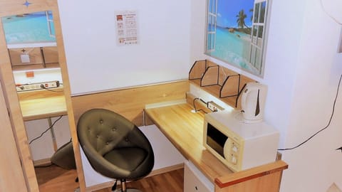 Standard Twin Room, Refrigerator & Microwave | Living area | 32-inch flat-screen TV with cable channels, TV, table tennis