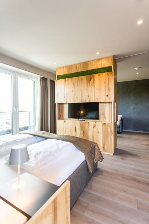 Suite | Hypo-allergenic bedding, in-room safe, desk, soundproofing