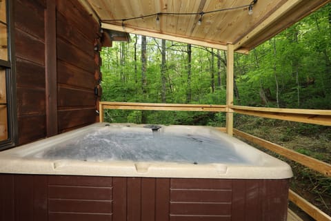 Back deck also has a private hot tub