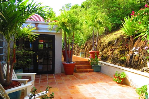 Main entry to the Villa via tiled decking from driveway