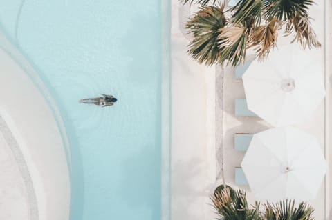 Outdoor pool, pool umbrellas, sun loungers