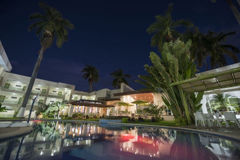 Outdoor pool, open 8:00 AM to 9:00 PM, pool umbrellas, sun loungers
