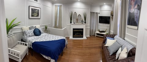 Enormous bedroom 1 with a Queen sized bed and 55” 4k TV