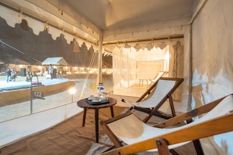 Luxury Tent, 1 Bedroom | Living area | Fireplace