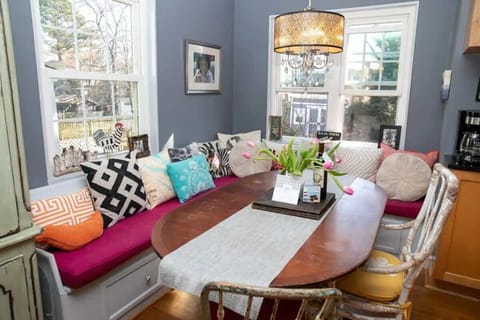 Lovely built in bench in open kitchen overlooking garden.