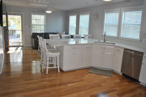 Beautiful large quartz counter top and stainless appliances