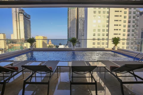 Outdoor pool, open 6:00 AM to 7:00 PM, sun loungers