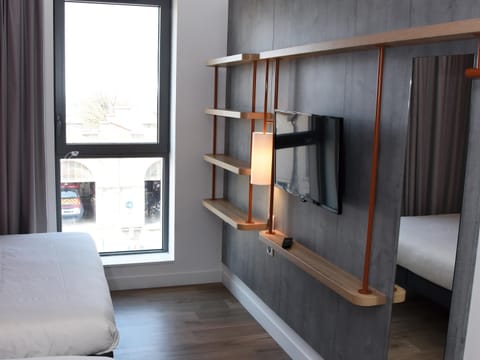 Triple Room, Multiple Beds | Soundproofing, free cribs/infant beds, free WiFi, bed sheets