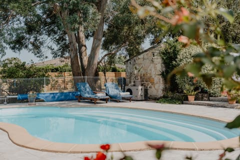 Seasonal outdoor pool, a heated pool, sun loungers