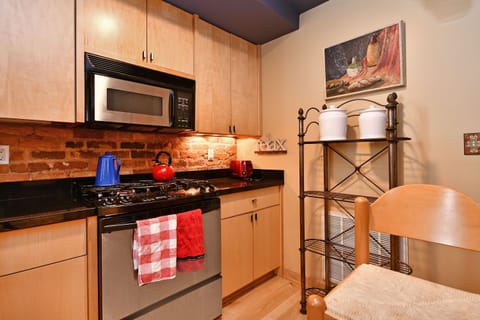 Kitchen Aid Gas Range and Microwave. 