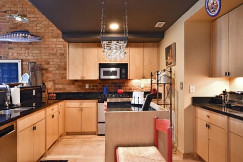 Full kitchen with everything you need to cook and serve a full gourmet meal.