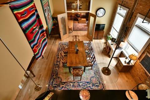 Full dining room and kitchen from loft.