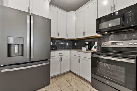 A fully equipped kitchen, ready for home-cooked moments