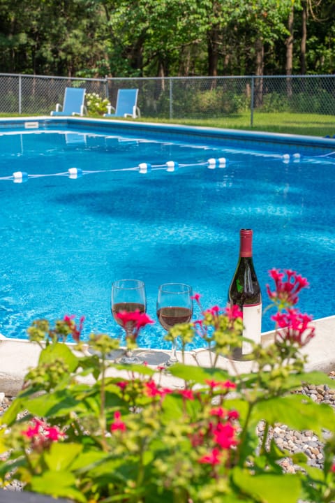 Private oasis awaits in the backyard secluded from the Main Street.