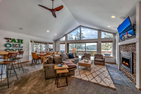 Sink into plush leather seating by your gas fireplace while mountain views fill the windows around you.