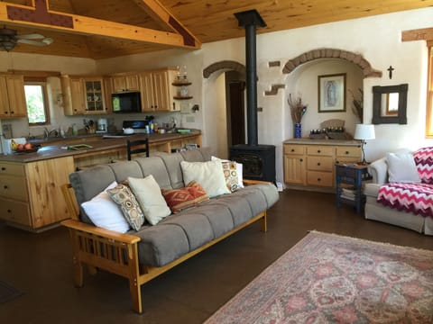 Great room, kitchen, dining, cathedral ceiling - ample yet efficient space.