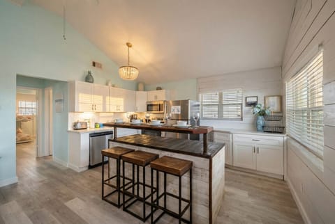 Create, innovate, and indulge in our chic and well-appointed kitchen