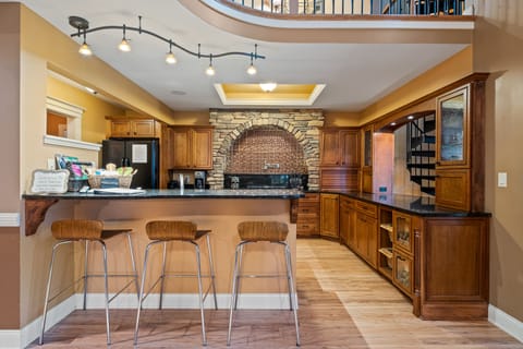 Kitchen with bar height counter.