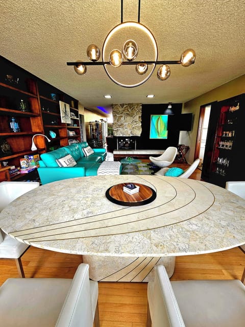 Family room / Dining room, fireplace, Smart tv, leather sectional, barware, view