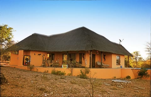 The Villa with hottub, fire place, braai, outside shower and drinking hole
