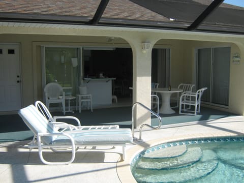 Great pool area with lanai and grilling area