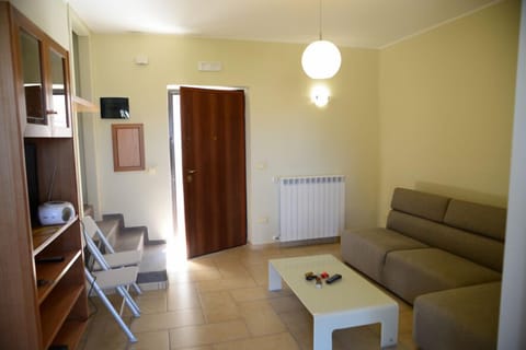 Front Entrance - Living room with TV & DVD