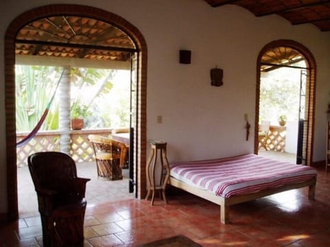 The livingroom area that opens up on to the big private porch.