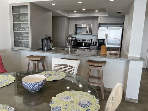 Contemporary styled, beach themed condo. 

Dining table seats 6. 
