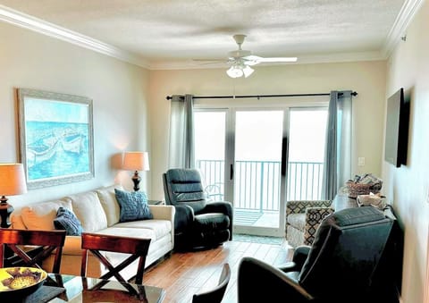 Living Room with 2 Lazyboy Recliners, Couch, Side Chair, and Smart TV