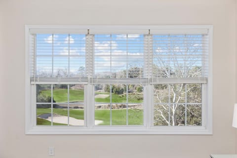 Master bedroom; golf course view from the BED!
