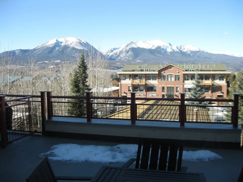 View of the patio and Gore Mountain Range from the downstairs living area